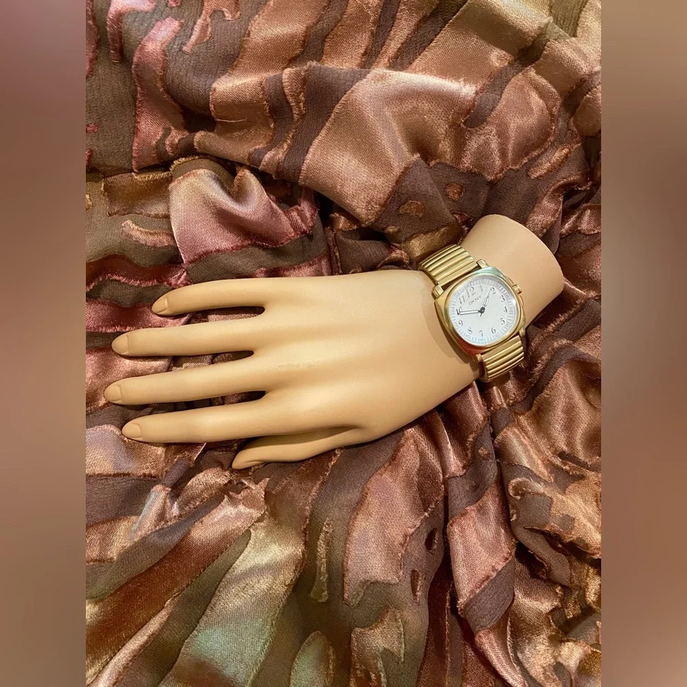 DKNY vintage women’s gold link watch